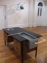 Paul Cullen, Desk, 2009, wooden desk, plastic pipes, galvanised steel, water, water pump and electric cord. 770 x 1700 x 1100 mm. Image courtesy of the artist and Jane Sanders.