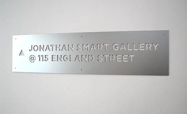 sign plate for new gallery address