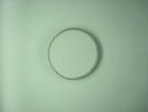 Johl Dwyer, White/white, 2012, found tyre with plaster. Compare this image with Sait Akkirman's on Artsdiary.