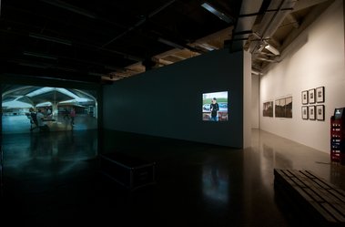 Left to right. Rebecca Ann Hobbs, Mangere Mall, 2011, single channel digital video; Louise Afoa, Reload, 2011, single channel video; Mark Adams, Hinemihi, Clandon Park, Surrey..., 2000, C types, and Hinemihi, Te Wairoa..; Ans Westra, Washday at the Pa.