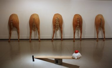 Francesca Heinz, Five Horse Arses, 2013, Latex, hair, cotton.  Dimensions variable. In foreground, Ben Terakes, See Saw, 2013, Cinder block, wood. Polyurethane foam, spray paint, air drying clay, dimensions variable. 