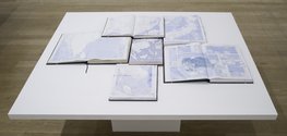 Tania Kovats, Only Blue, 2013, table, open atlases, acrylic. Courtesy of the artist. Photograph: Ruth Clark