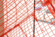 Philippa Nielsen, Orange Cube, detail, orange temporary fencing, orange thread, cuphook