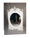 James Oram, used mirror for sale, circular with white frame, 2015, found image, custom display case. Photo: Justin Spiers