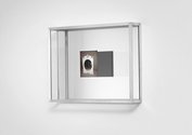 James Oram, used mirror for sale, circular with white frame, 2015, detail, found image, custom display case. Photo: Justin Spiers