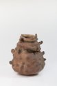 Wi Taepa, Nuku Puta, 1994, from Kauhuri Cultivation, anagama-fired red raku clay, 320 x 280 mm. Collection of The Dowse Museum