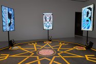 Jess Johnson and Simon Ward, Whol Why Wurld, 2017, five looped video animations, audio, colour, 0.31 min loop, raised decagon platform, vinyl, soundtrack by Andrew Clark, as installed at Auckland Art Gallery Toi o Tamaki