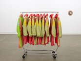 Ani O'Neill, SQUAD SUITS (2004 - ), collection of found shell-tracksuits, rack, hangers. Photo: Sam Hartnett