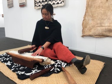 Nikau Hindin pounds aute, as her works are installed at Te Uru. Image from the website of Maori TV, May 2019. 