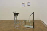 Severine Costa, Ab(so)lution, 2019, second-hand blue sink and taps, fish tank, garden piping, hand pump, tumeric soap, monitoring charts. Image: Andreea Christache    